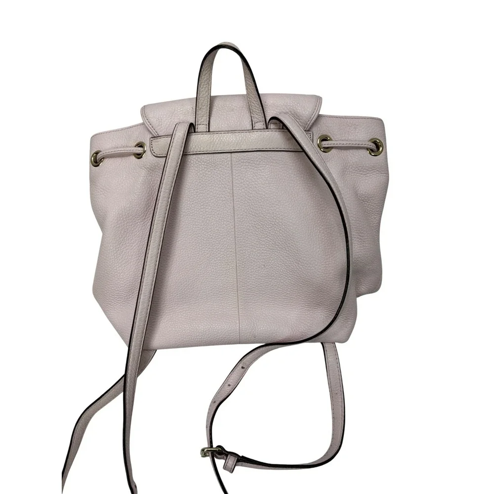 Kate Spade New York Pebbled Leather Drawstring Backpack Lavender Pink Gold Tone